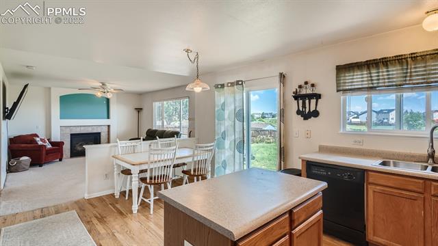 7691 Tompkins Road Peyton, CO 80831 - Photo 8 of 36 Kitchen, Dining Area and Family Room