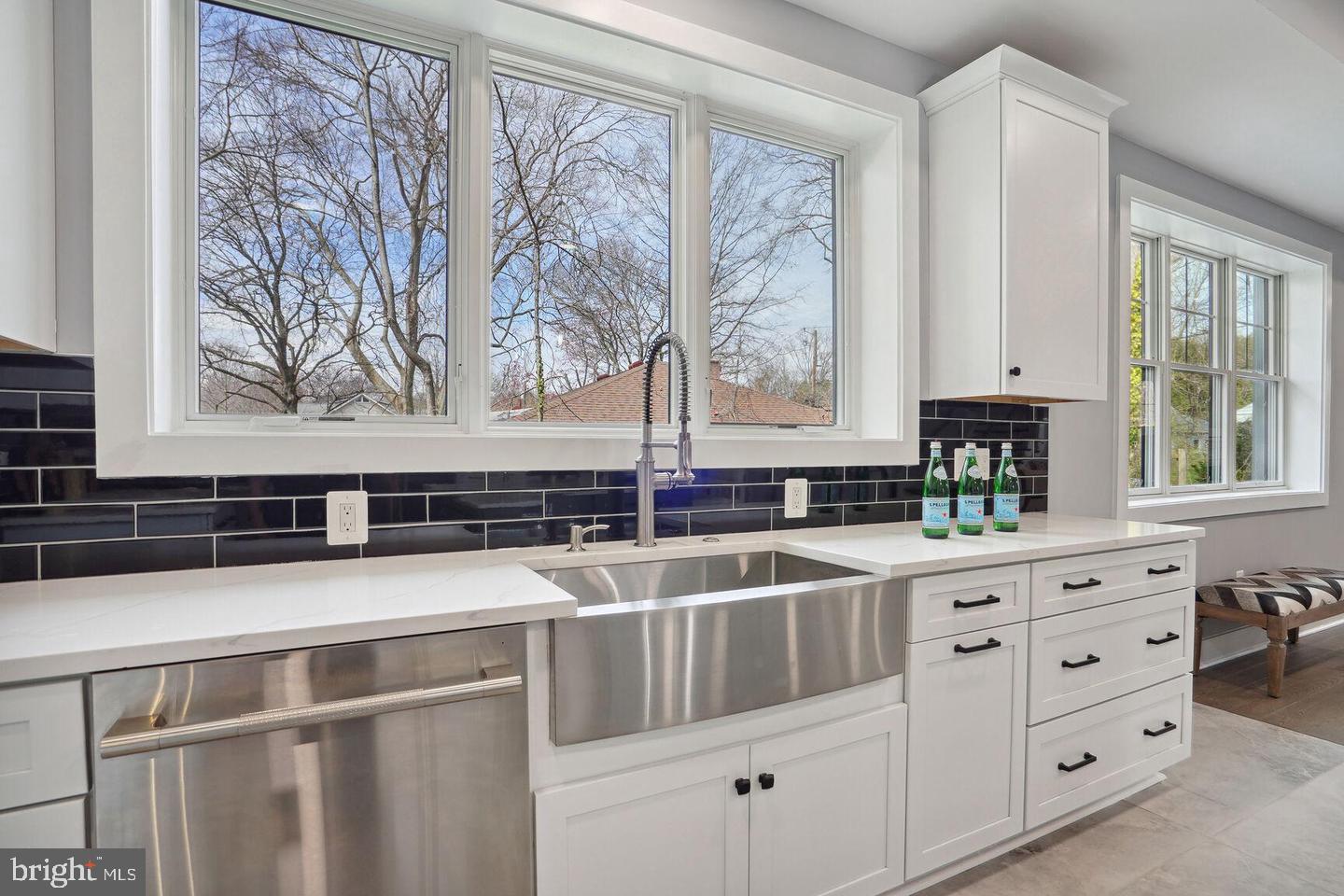 8616 Jones Mill Road Chevy Chase, MD 20815 - Photo 27 of 81 Stainless Steel Farmhouse Sink and custom tile