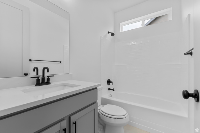 1869 South 2425 West Ogden, UT 84401 - Photo 8 of 22 Bathroom with vanity and shower combination