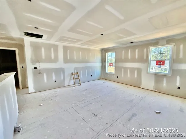a view of livingroom with furniture and window