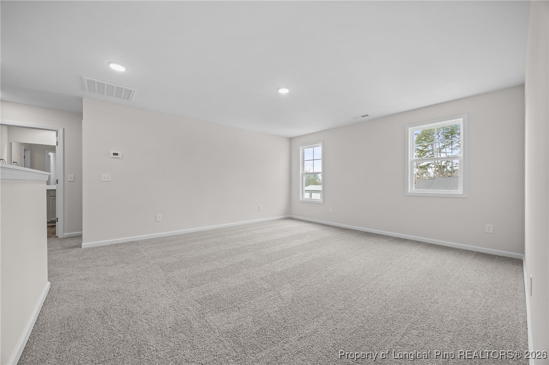 62 Regis Lane Coats, NC 27521 - Photo 19 of 38 a view of an empty room with a window