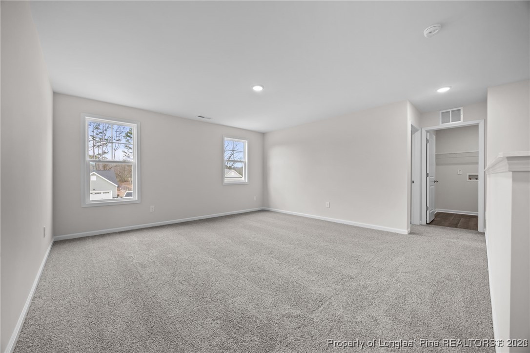 62 Regis Lane Coats, NC 27521 - Photo 21 of 38 a view of an empty room with a window