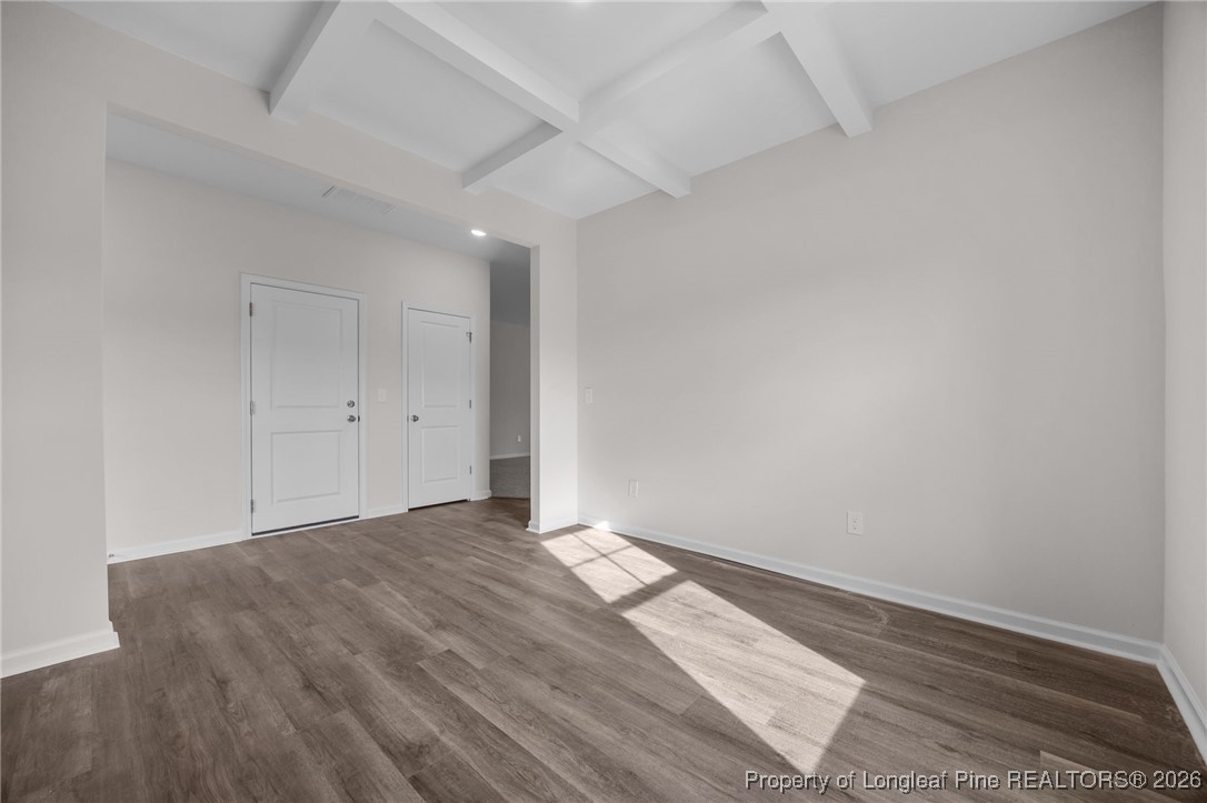 62 Regis Lane Coats, NC 27521 - Photo 4 of 38 a view of empty room with wooden floor