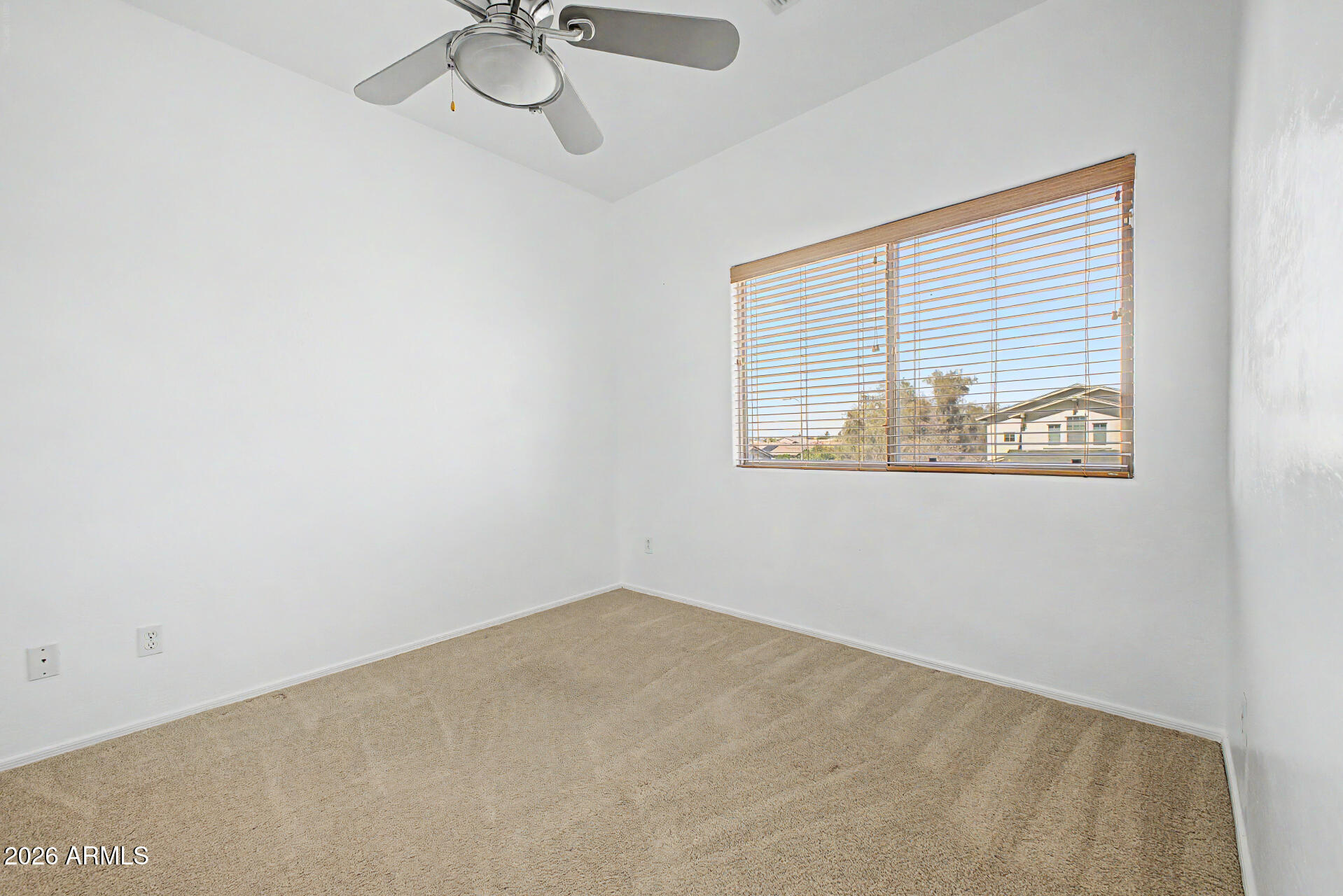 7206 South 12th Way Phoenix, AZ 85042 - Photo 26 of 34 an empty room with a window