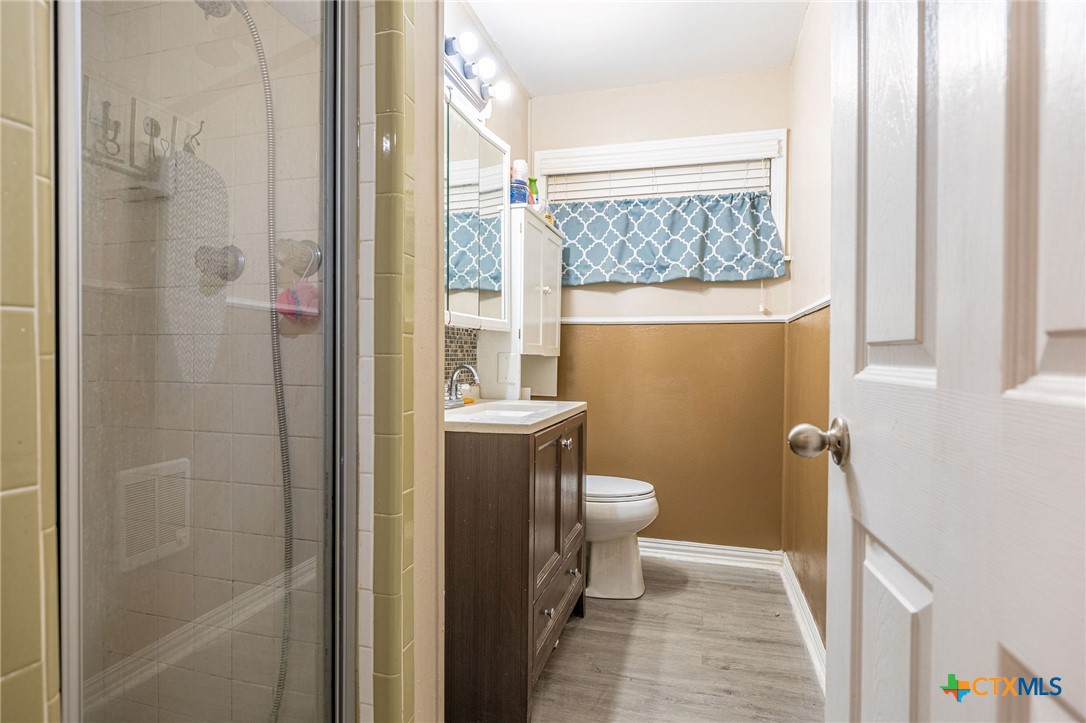 743 Royal Road Port Lavaca, TX 77979 - Photo 7 of 21 a bathroom with a toilet and a shower