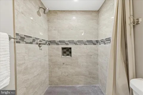 a view of balcony with wooden floor