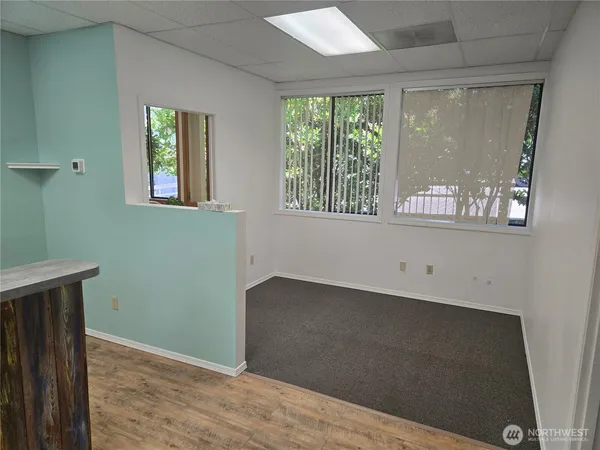 an empty room with windows