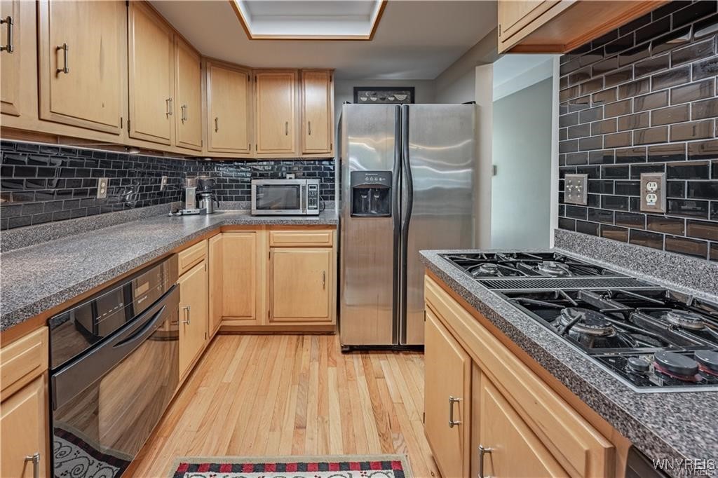 5948 Chestnut Road Newfane, NY 14094 - Photo 7 of 41 Kitchen w/ Breakfast Counter