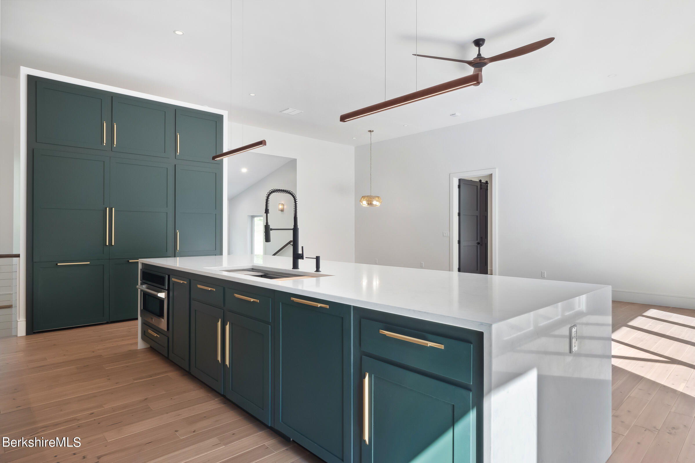 112 Tyringham Road Monterey, MA 01245 - Photo 12 of 57 a kitchen with a sink and a refrigerator