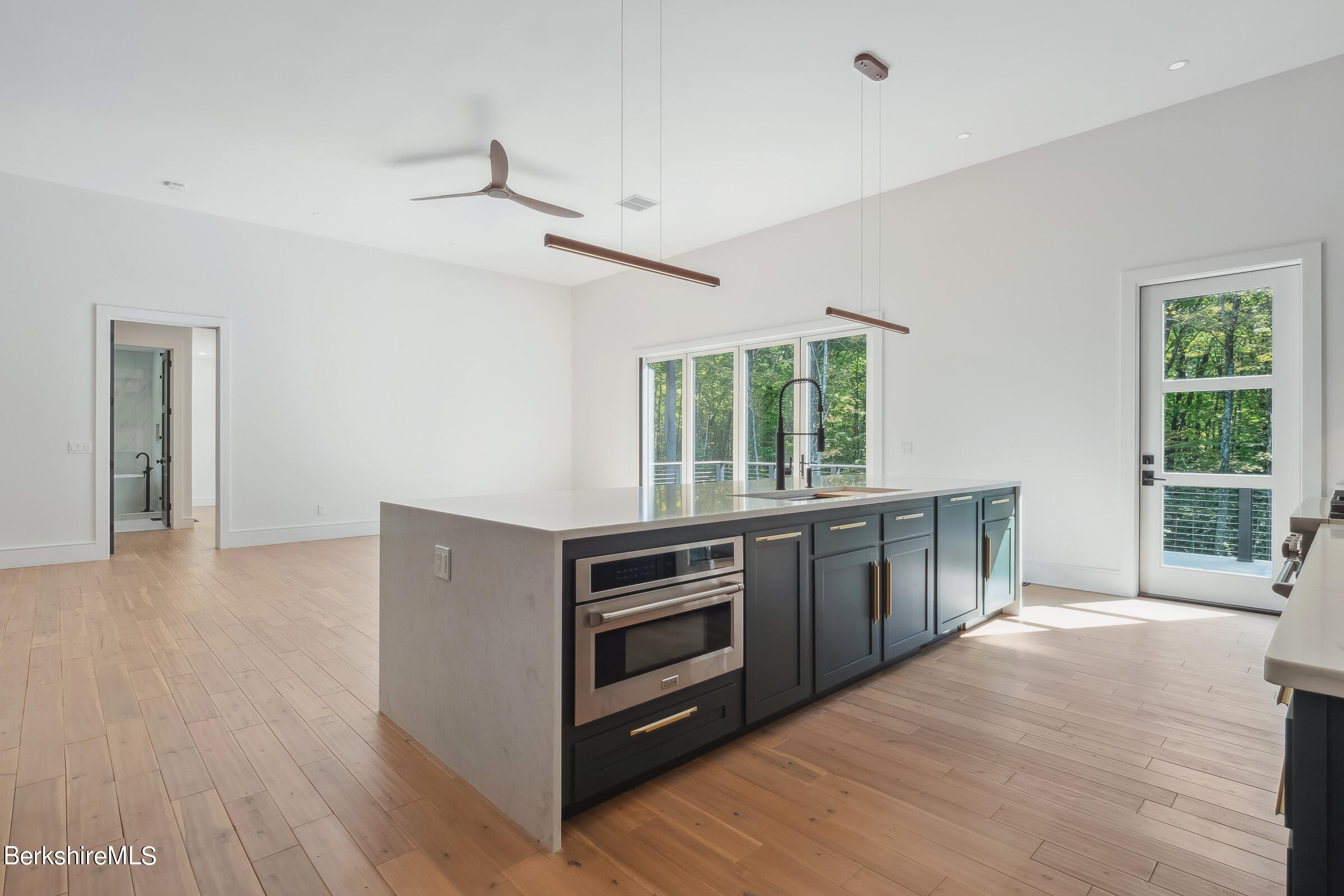 112 Tyringham Road Monterey, MA 01245 - Photo 14 of 57 a kitchen with a stove oven and sink