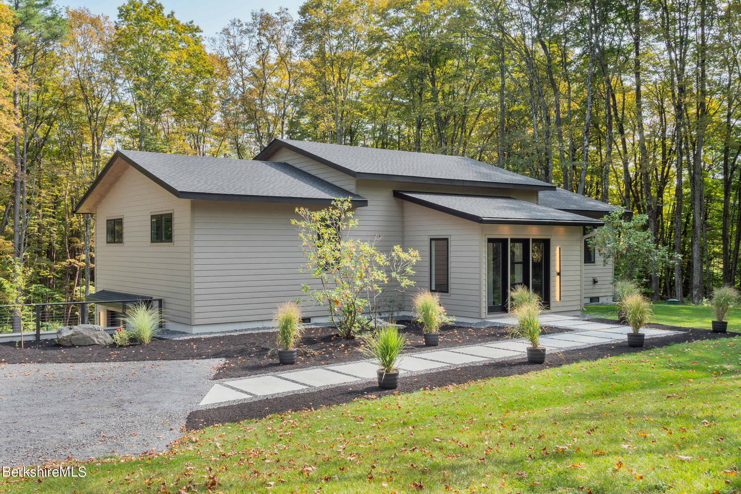 112 Tyringham Road Monterey, MA 01245 - Photo 2 of 57 a front view of a house with a yard