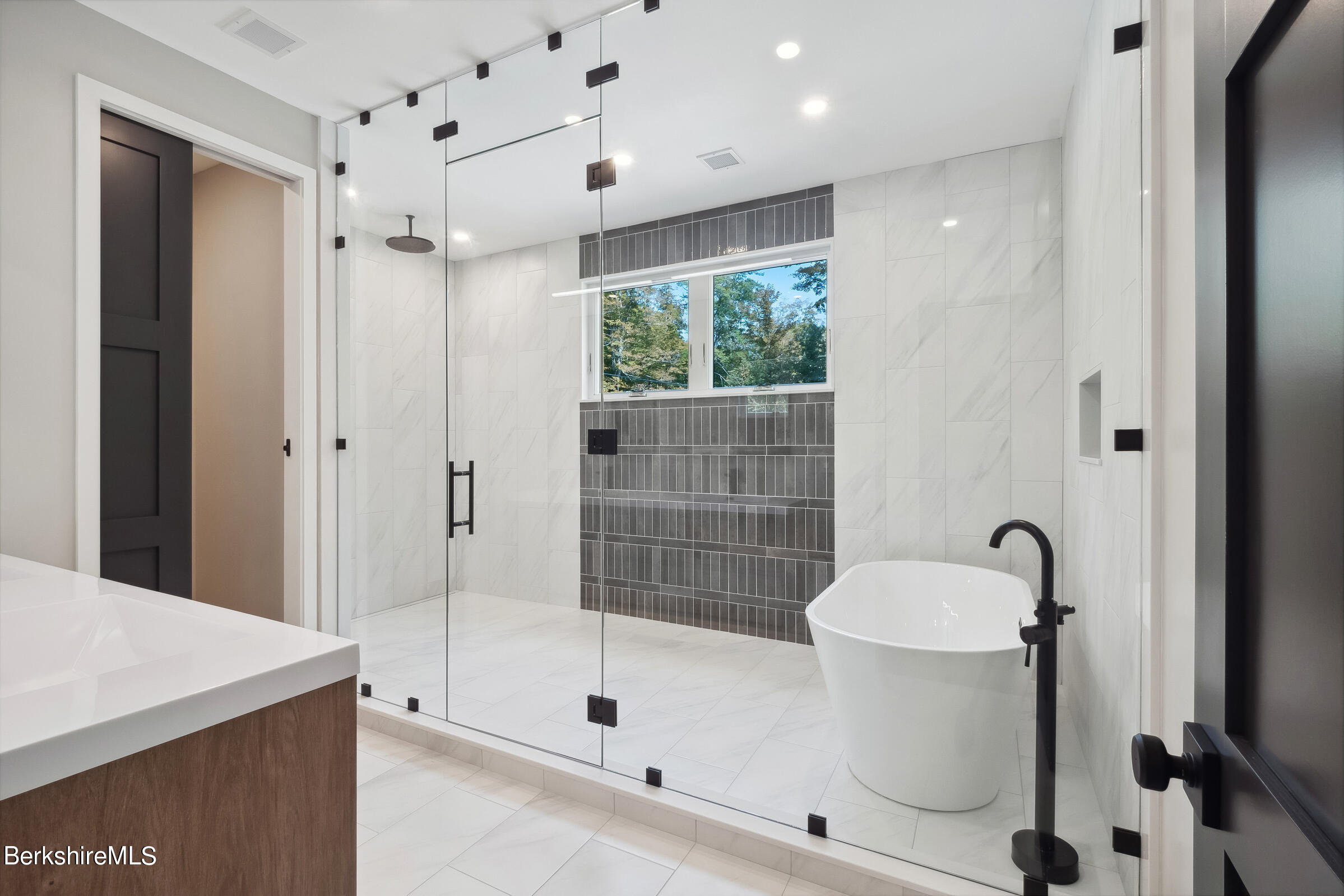 112 Tyringham Road Monterey, MA 01245 - Photo 28 of 57 a bathroom with a sink a toilet and shower