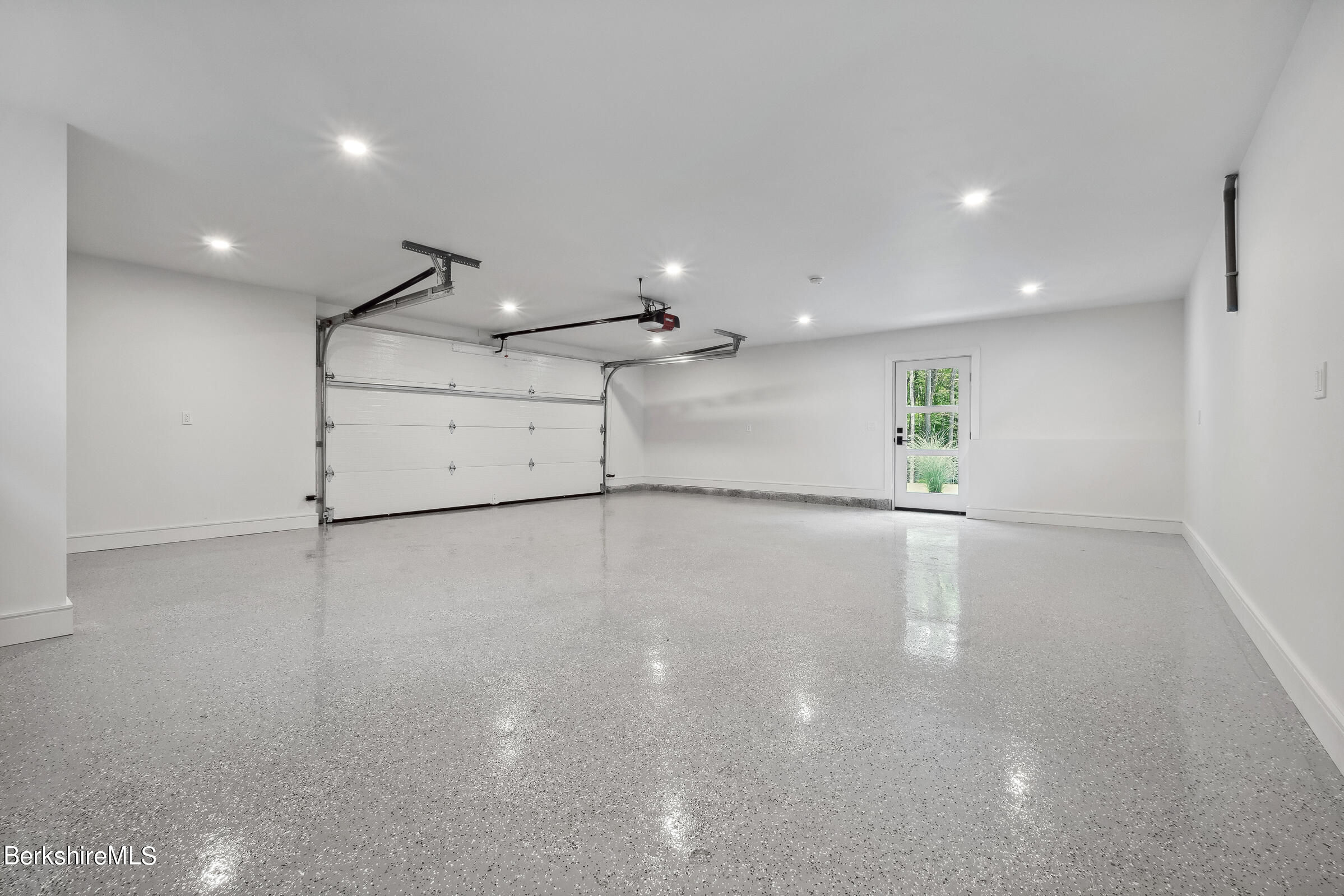112 Tyringham Road Monterey, MA 01245 - Photo 48 of 57 a view of a livingroom with an empty space
