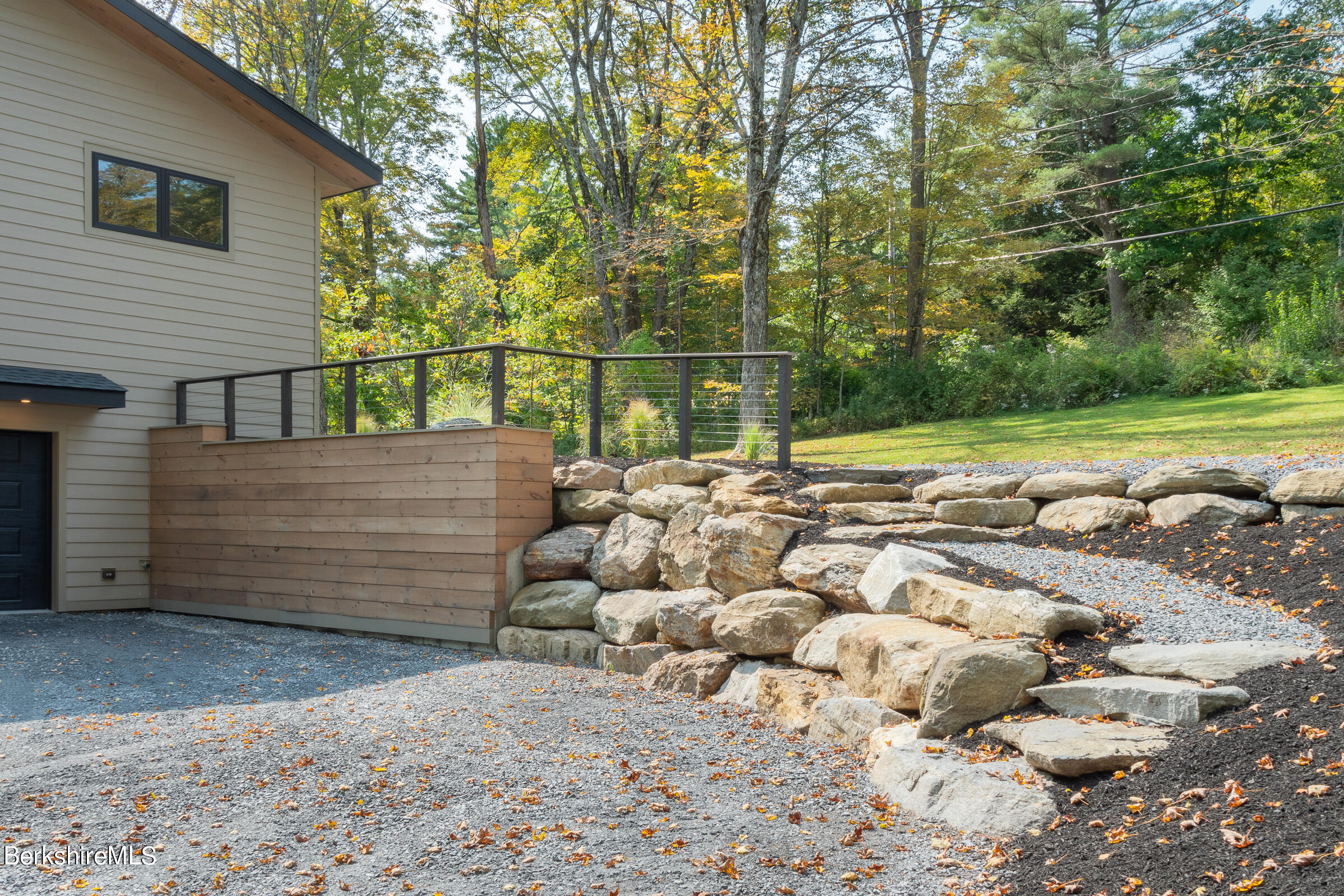 112 Tyringham Road Monterey, MA 01245 - Photo 49 of 57 a view of a yard with wooden fence