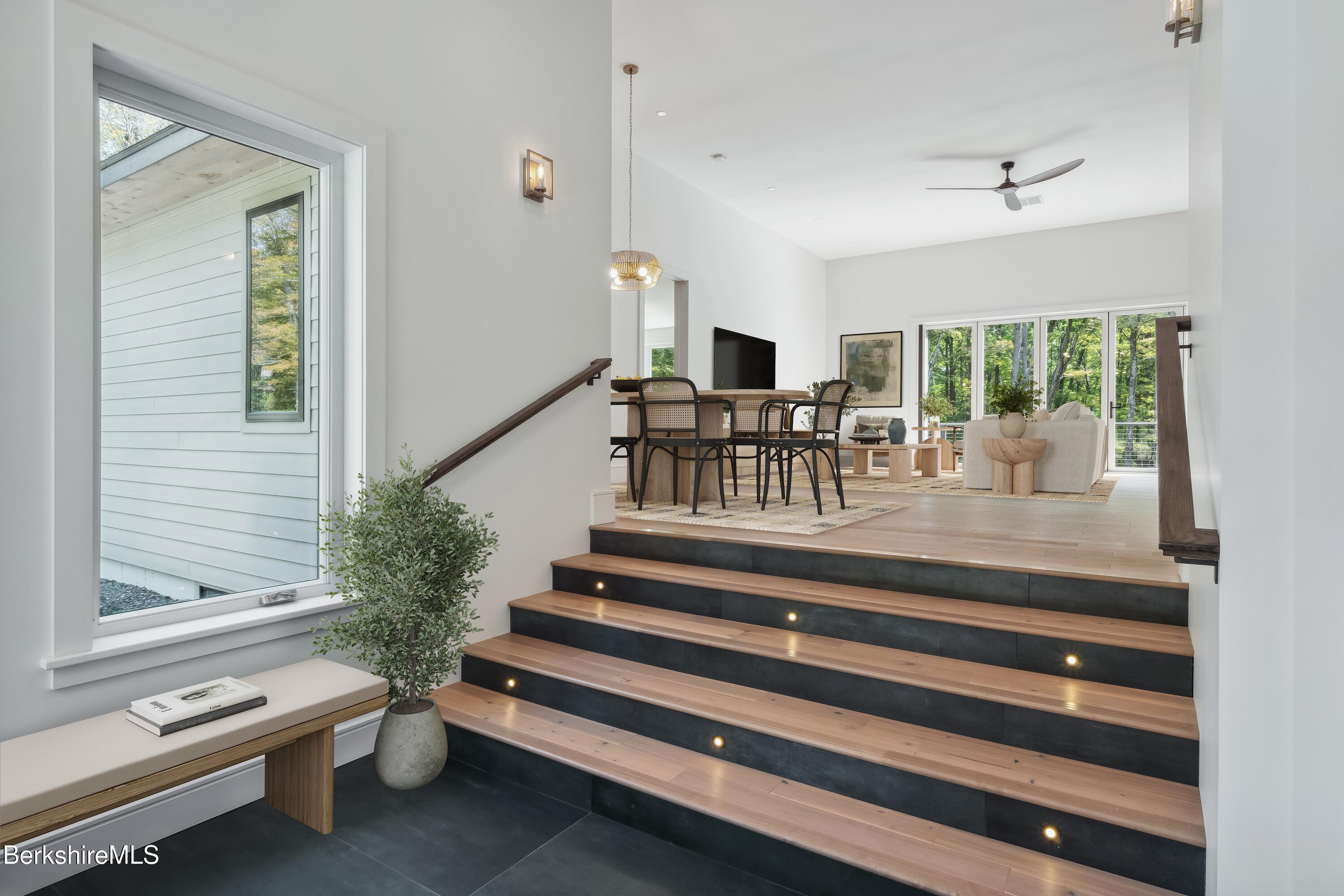 112 Tyringham Road Monterey, MA 01245 - Photo 5 of 57 a view of hall way with furniture and floor to ceiling window