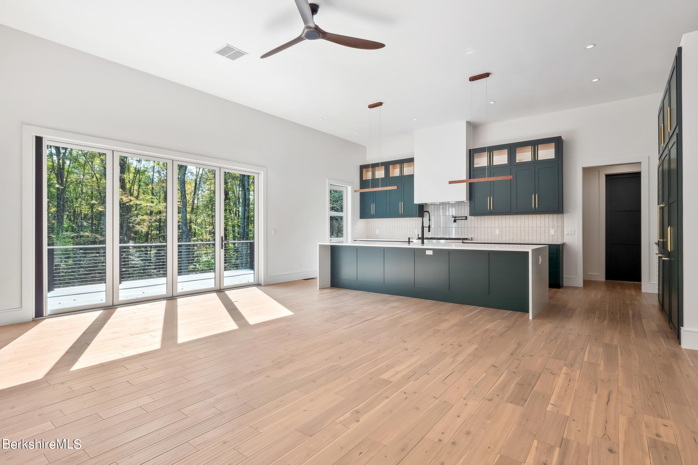 112 Tyringham Road Monterey, MA 01245 - Photo 8 of 57 a view of kitchen with a sink and a large window