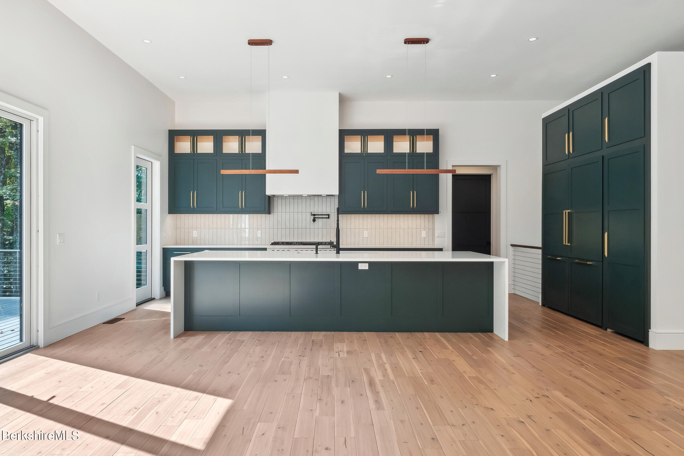 112 Tyringham Road Monterey, MA 01245 - Photo 10 of 57 a kitchen with stainless steel appliances granite countertop a refrigerator and a sink