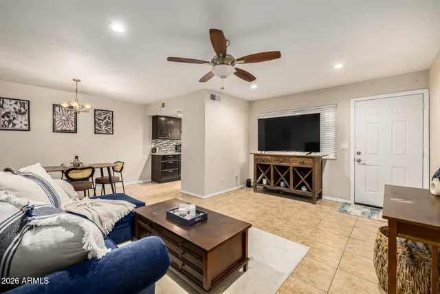 a view of a livingroom with furniture and lounge chair