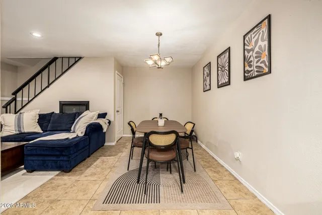 a view of a dining room with furniture