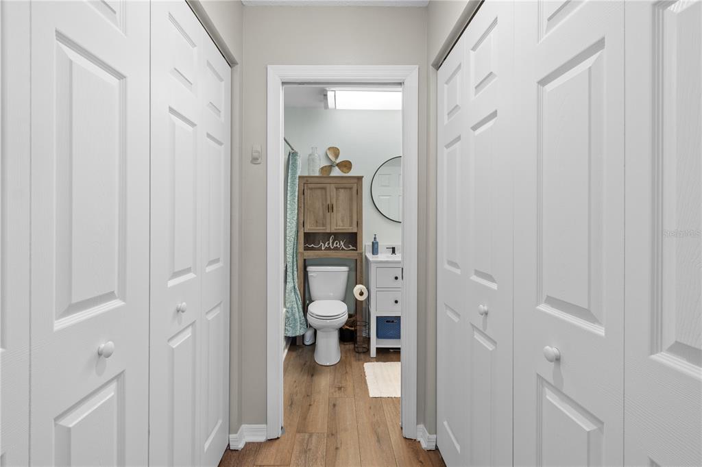 1752 Stickney Point Road, Unit 102 Sarasota, FL 34231 - Photo 35 of 50 a view of a bathroom from a hallway