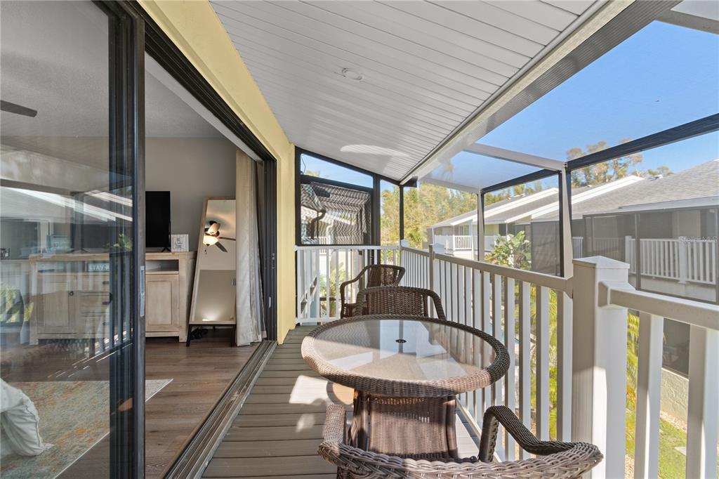1752 Stickney Point Road, Unit 102 Sarasota, FL 34231 - Photo 42 of 50 a view of a balcony with furniture