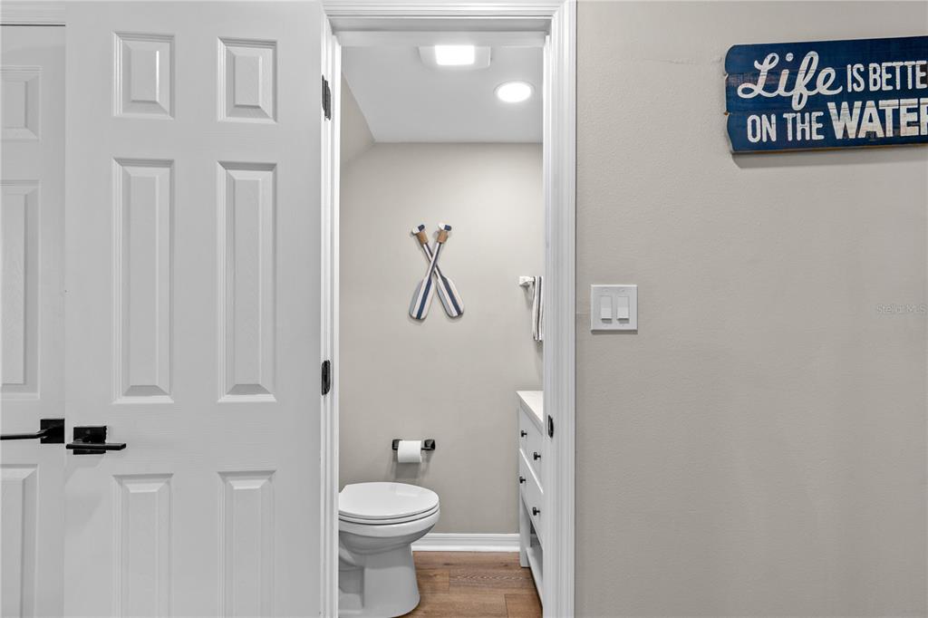 1752 Stickney Point Road, Unit 102 Sarasota, FL 34231 - Photo 8 of 50 a bathroom with a toilet and a shower