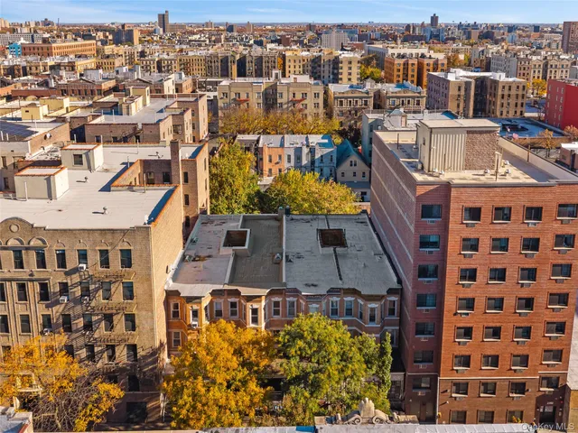a view of a city with tall buildings
