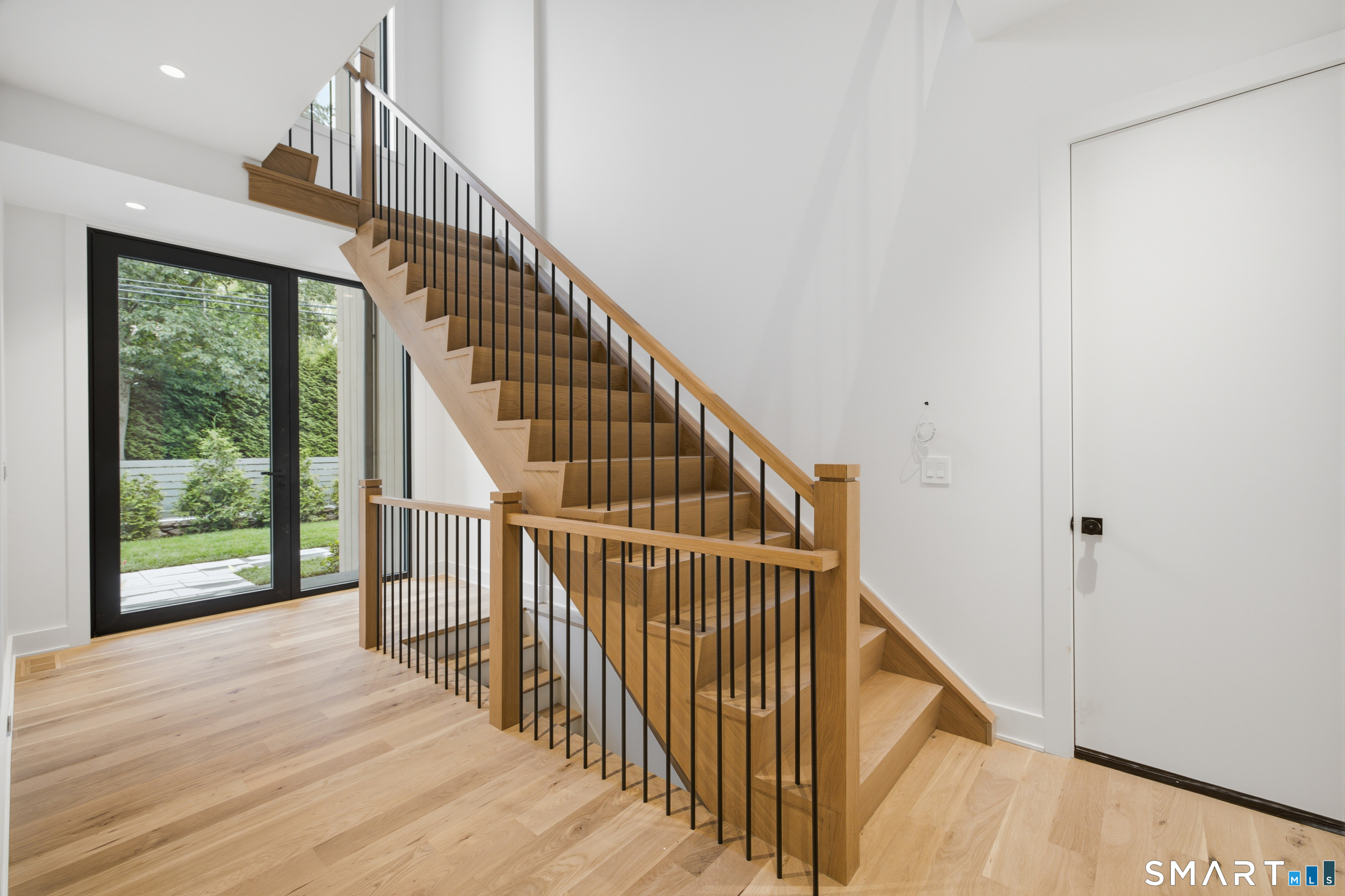 2 Windy Hill Road Westport, CT 06880 - Photo 32 of 40 a view of entryway with wooden floor