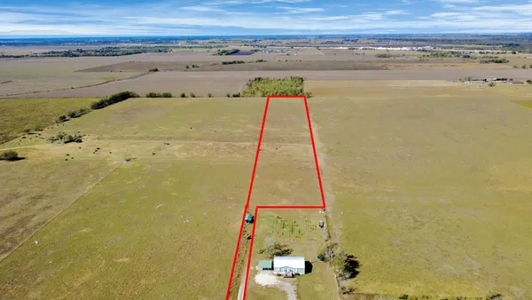 a view of an ocean and mountain