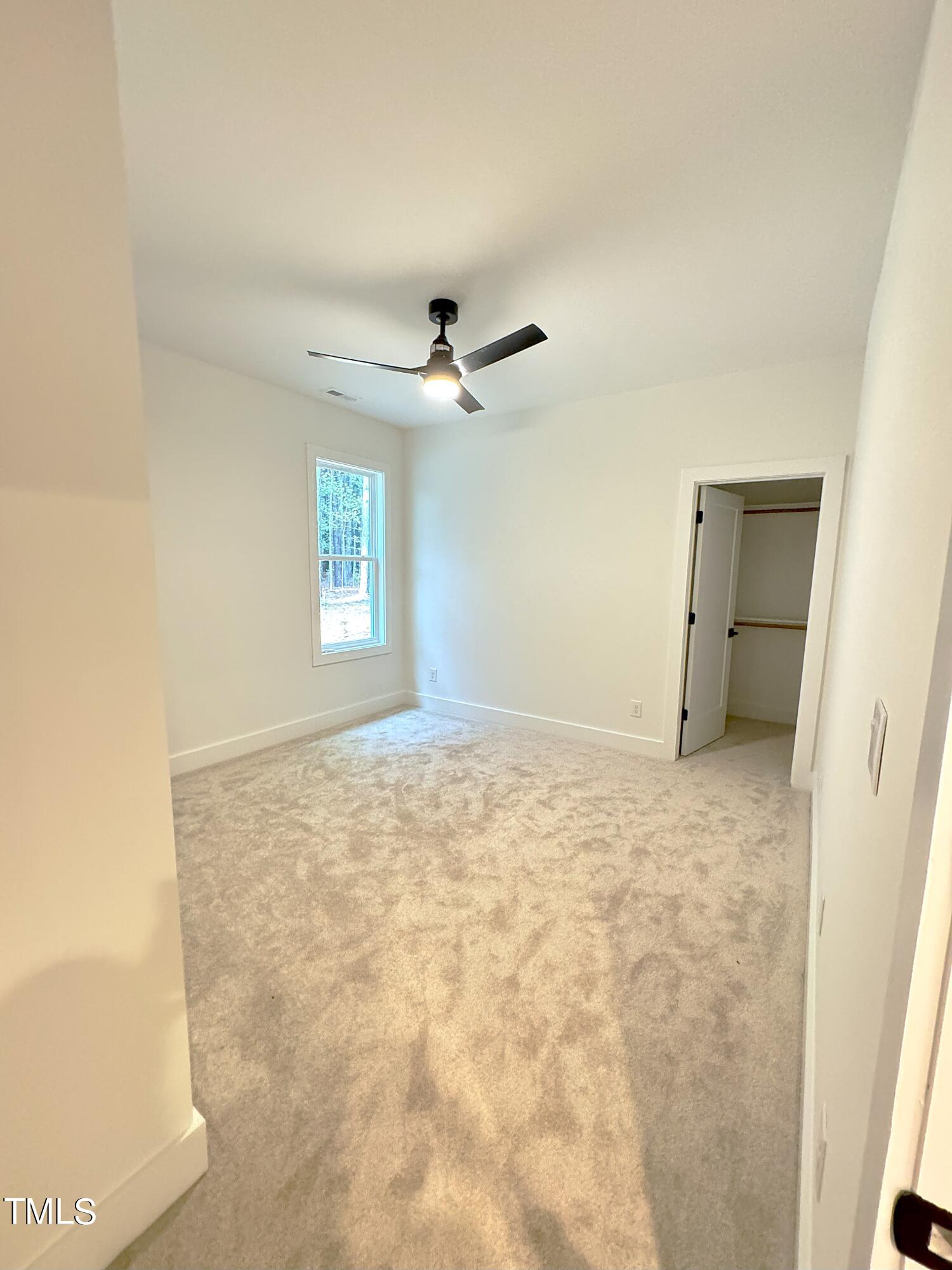 1101 South Chavis Road Kittrell, NC 27544 - Photo 14 of 20 a view of empty room with a ceiling fan