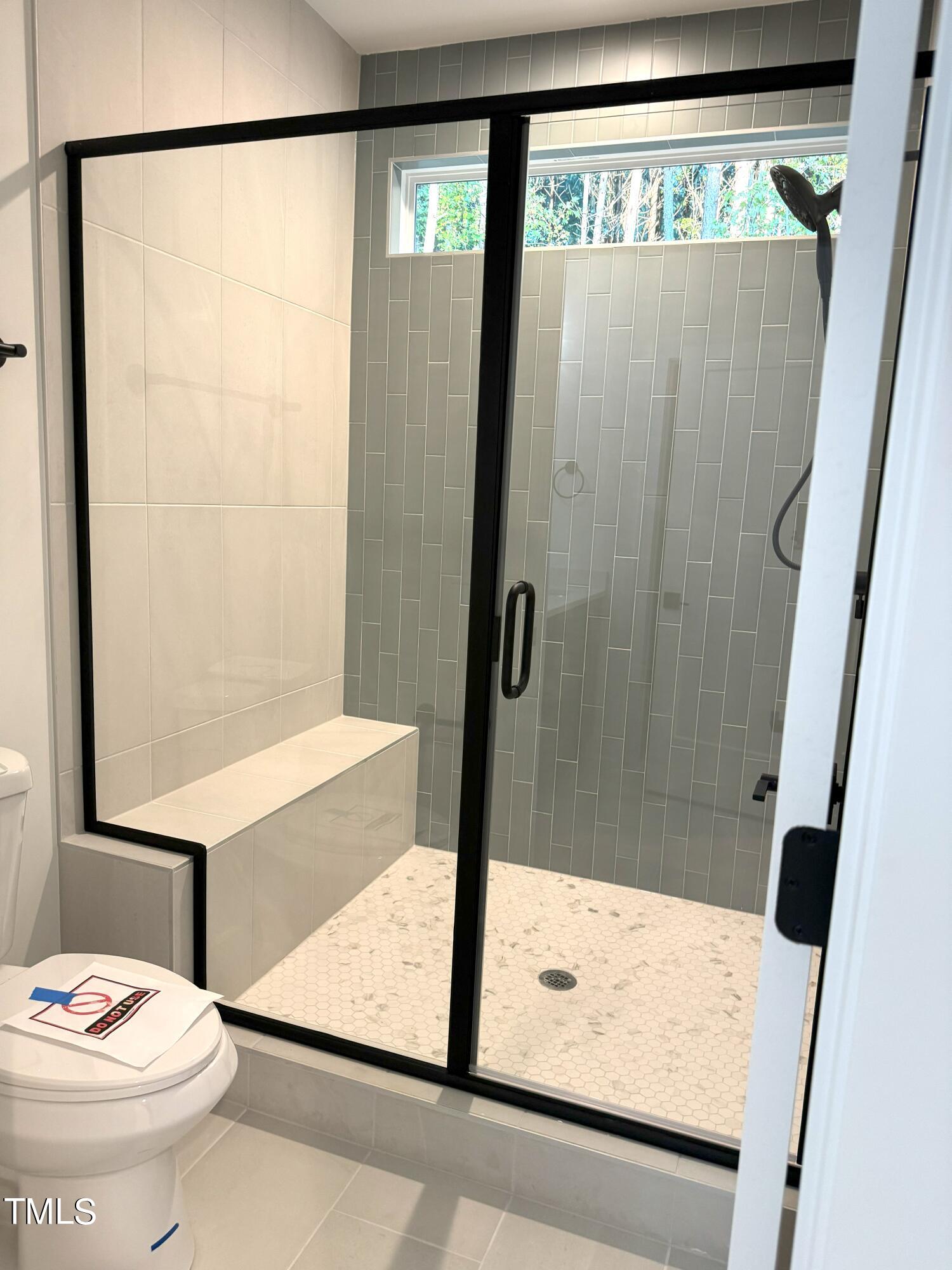 1101 South Chavis Road Kittrell, NC 27544 - Photo 9 of 20 a bathroom with a shower and a sink