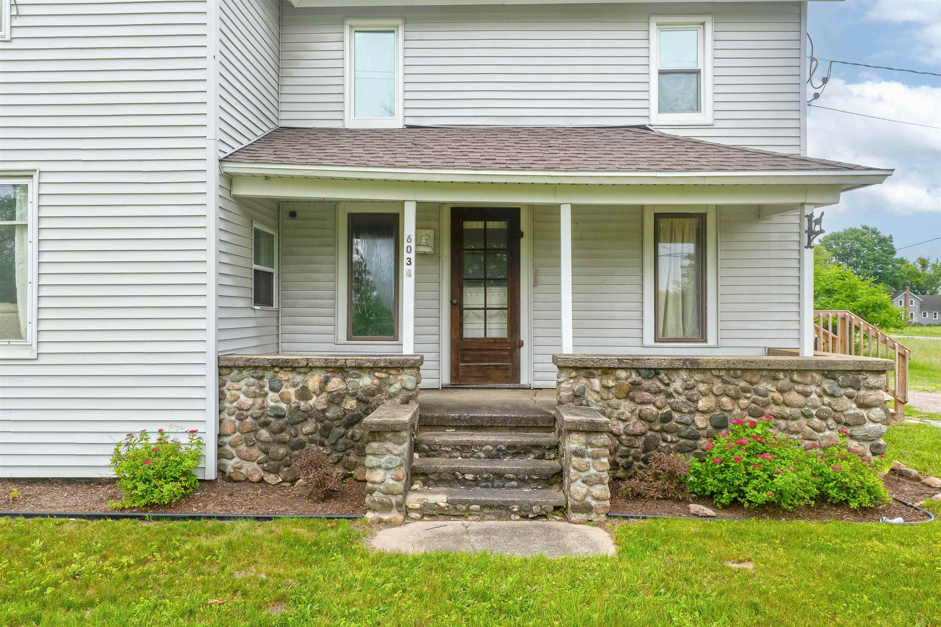 6034 Bates Road Williamsburg, MI 49690 - Photo 2 of 14 1947420-e63bc1ea-7077-42a9-b5a6-7359773fd7bf.JPG