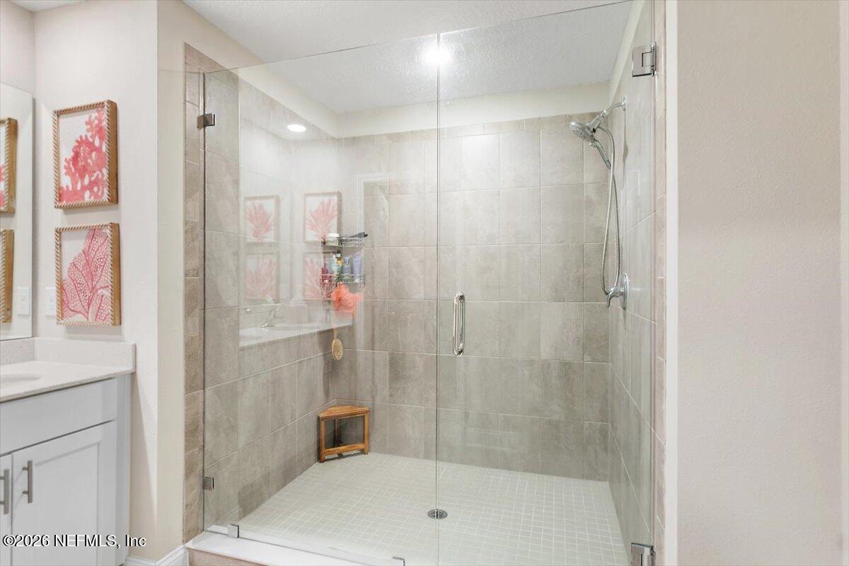 15 Zancara Street St. Augustine, FL 32084 - Photo 21 of 46 a bathroom with a shower and a sink