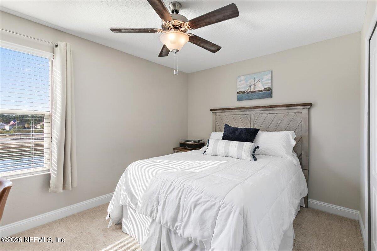15 Zancara Street St. Augustine, FL 32084 - Photo 23 of 46 a bedroom with a bed and a window