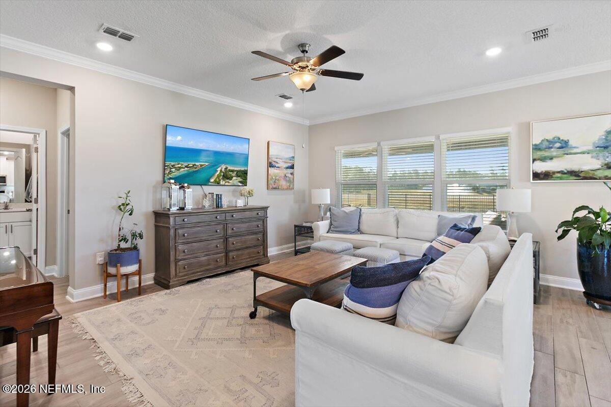 15 Zancara Street St. Augustine, FL 32084 - Photo 5 of 46 a living room with furniture and a large window