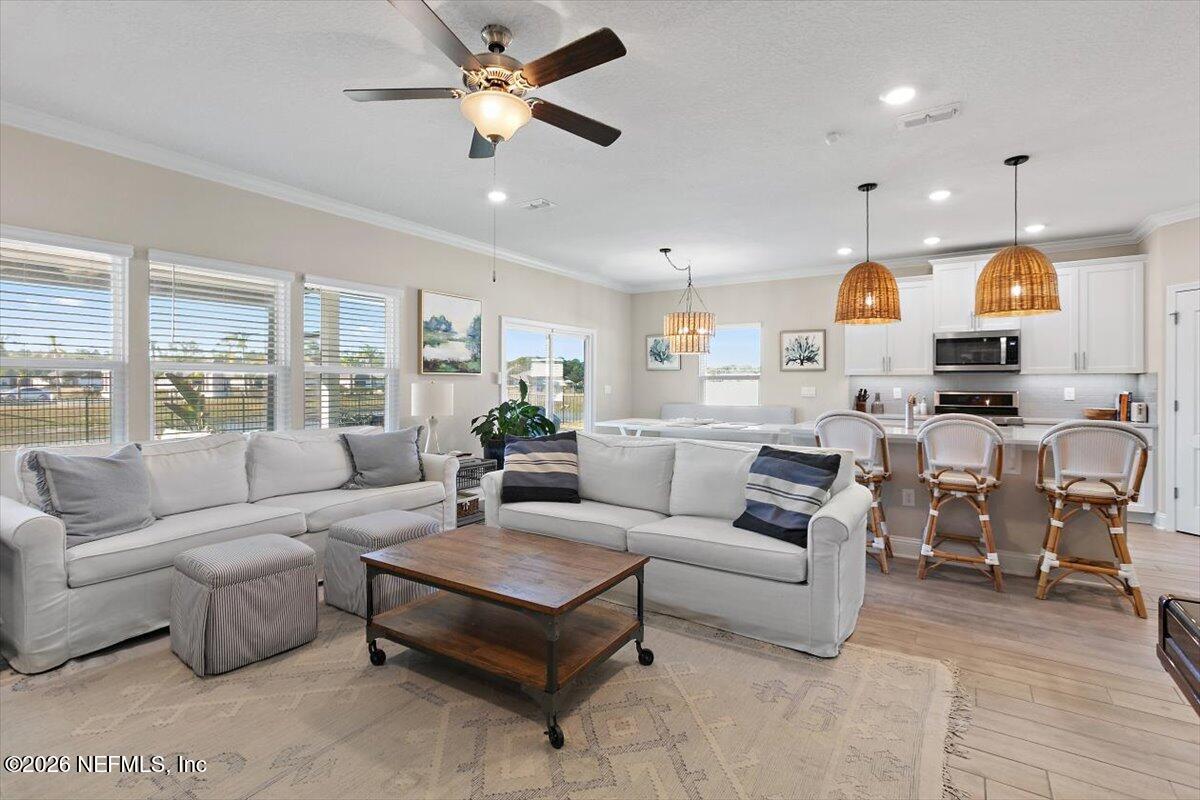 15 Zancara Street St. Augustine, FL 32084 - Photo 6 of 46 a living room with furniture kitchen view and a large window