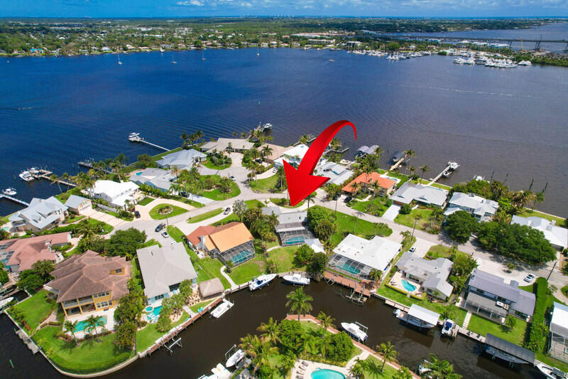 1209 Southwest Dyer Point Road Palm City, FL 34990 - Photo 1 of 56 aerial9.jpg-vsuniqueid-69e28689daa48
