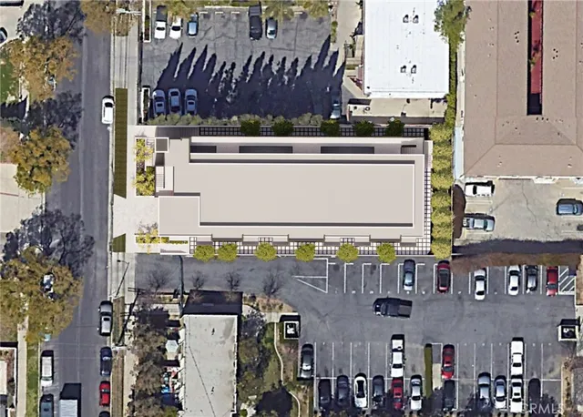 a aerial view of multi story residential apartment building