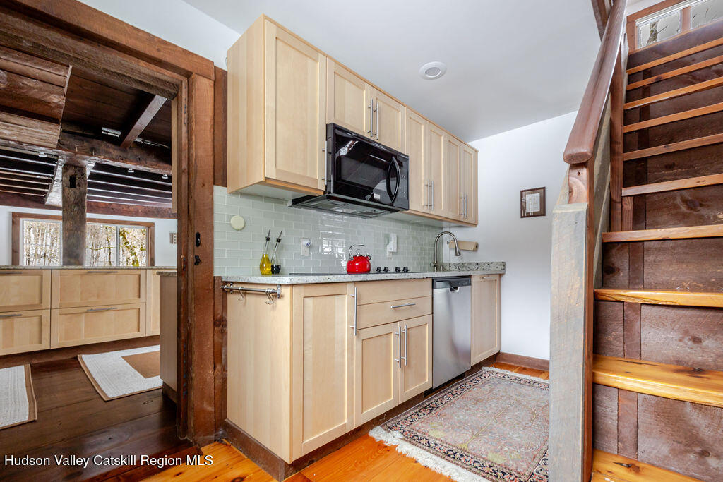 91 Miller Road Canaan, NY 12029 - Photo 11 of 29 a kitchen with stainless steel appliances a stove and a refrigerator