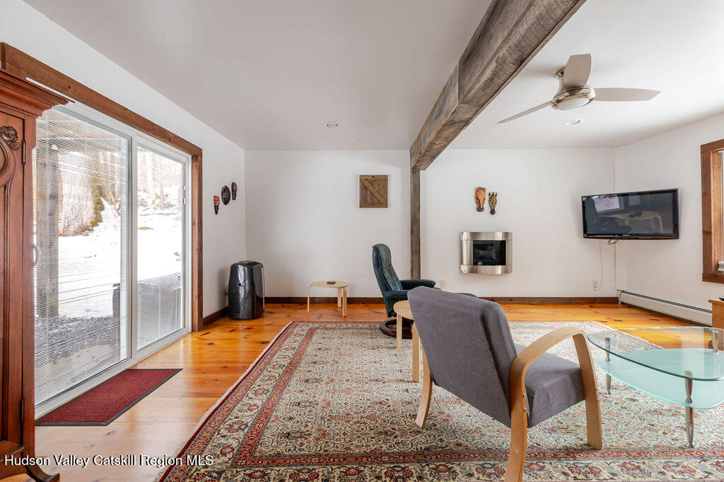 91 Miller Road Canaan, NY 12029 - Photo 14 of 29 a living room with furniture and a flat screen tv