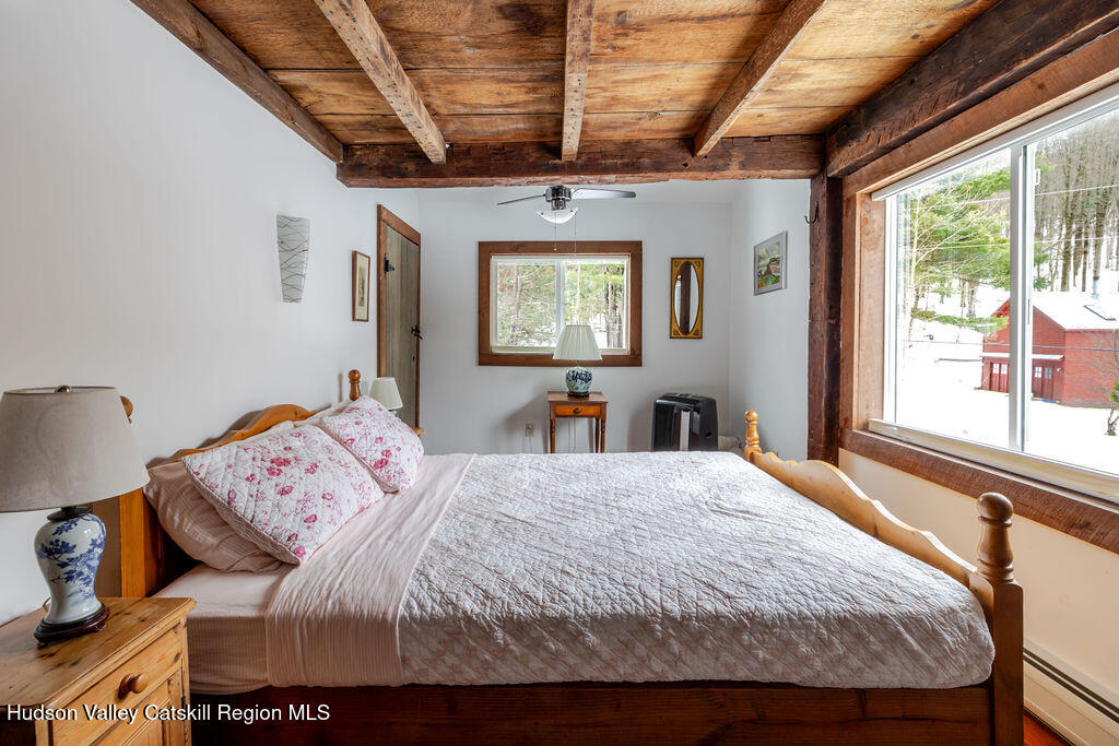 91 Miller Road Canaan, NY 12029 - Photo 20 of 29 a bedroom with a large bed and a window