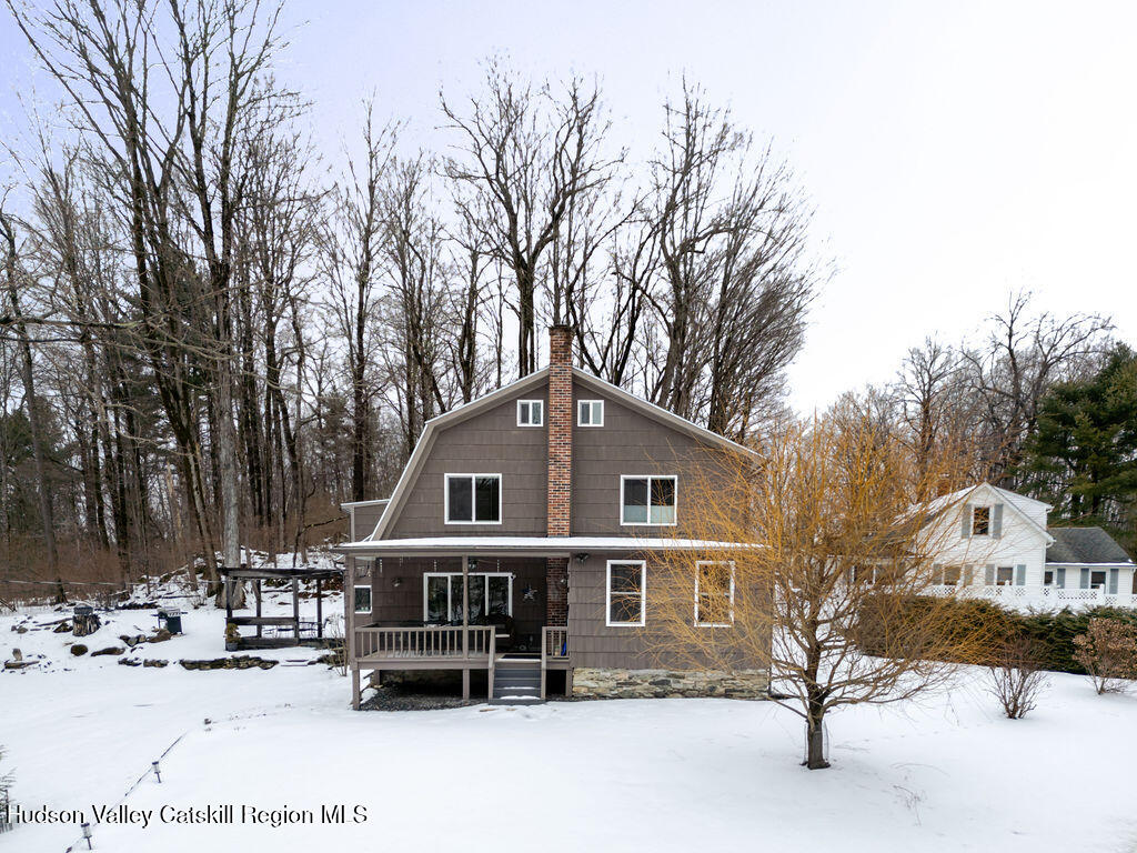 91 Miller Road Canaan, NY 12029 - Photo 2 of 29 a front view of a house with a yard
