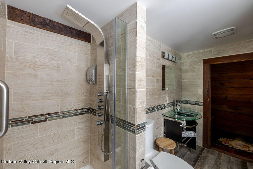 91 Miller Road Canaan, NY 12029 - Photo 23 of 29 a bathroom with a shower and a sink