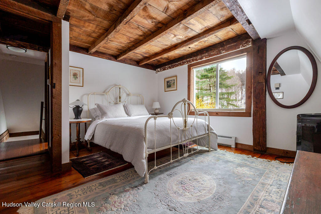 91 Miller Road Canaan, NY 12029 - Photo 24 of 29 a bed room with a bed and a window