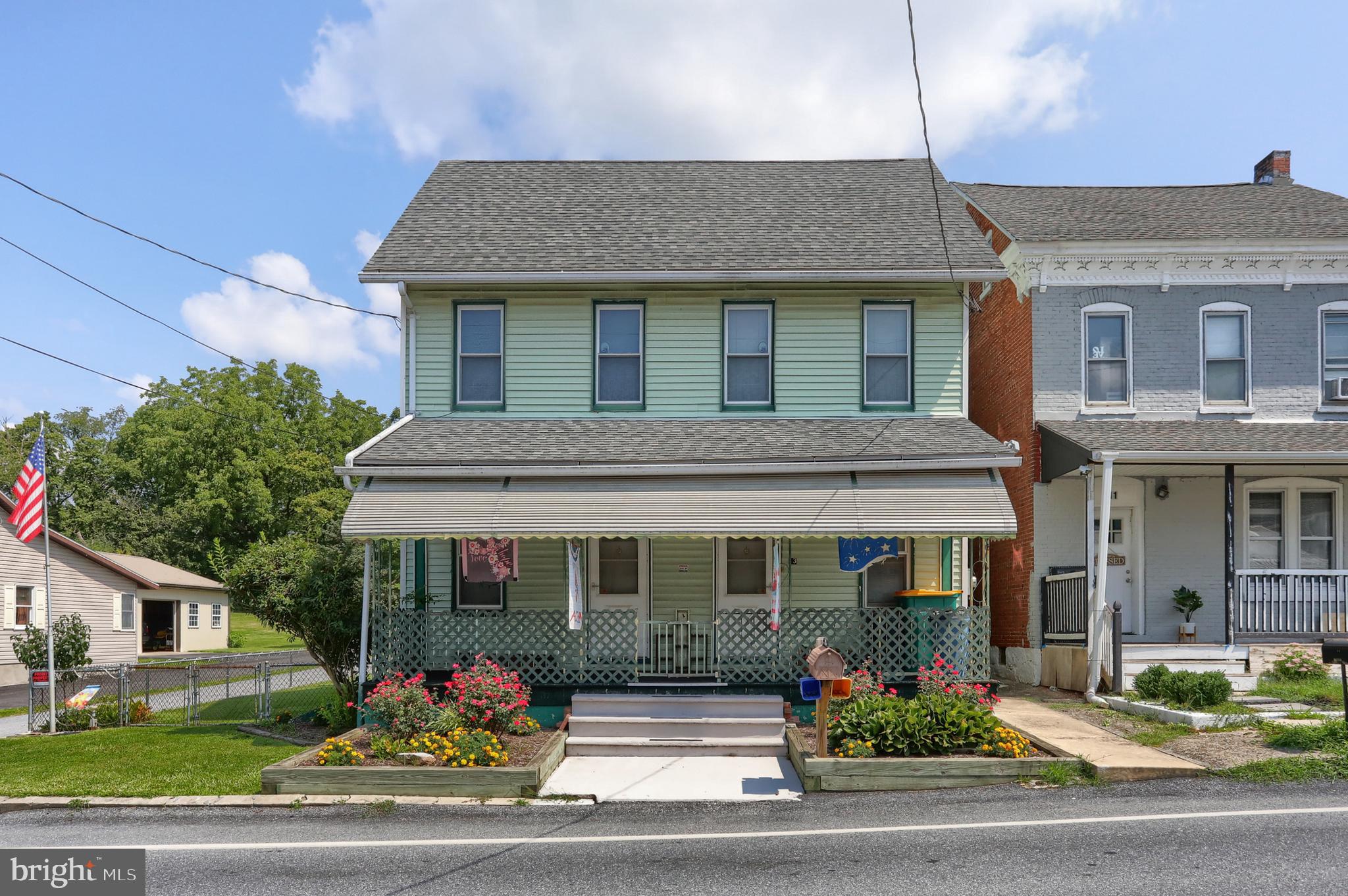 13 Montello Road Reading, PA 19608 - Photo 1 of 54 a front view of a house with a porch