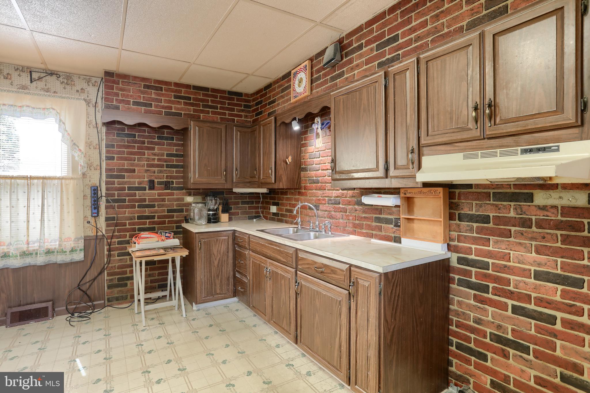 13 Montello Road Reading, PA 19608 - Photo 21 of 54 a kitchen with a sink cabinets and window
