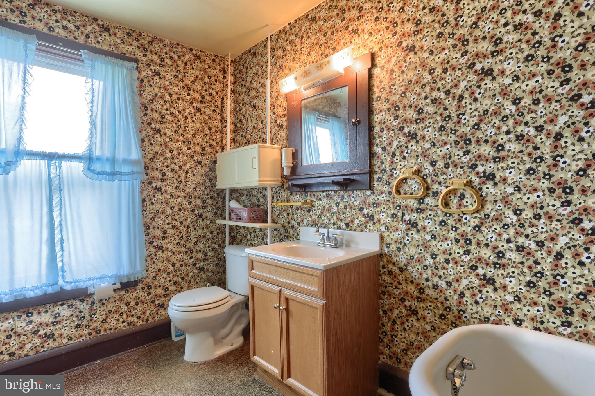 13 Montello Road Reading, PA 19608 - Photo 36 of 54 a bathroom with a sink toilet and mirror