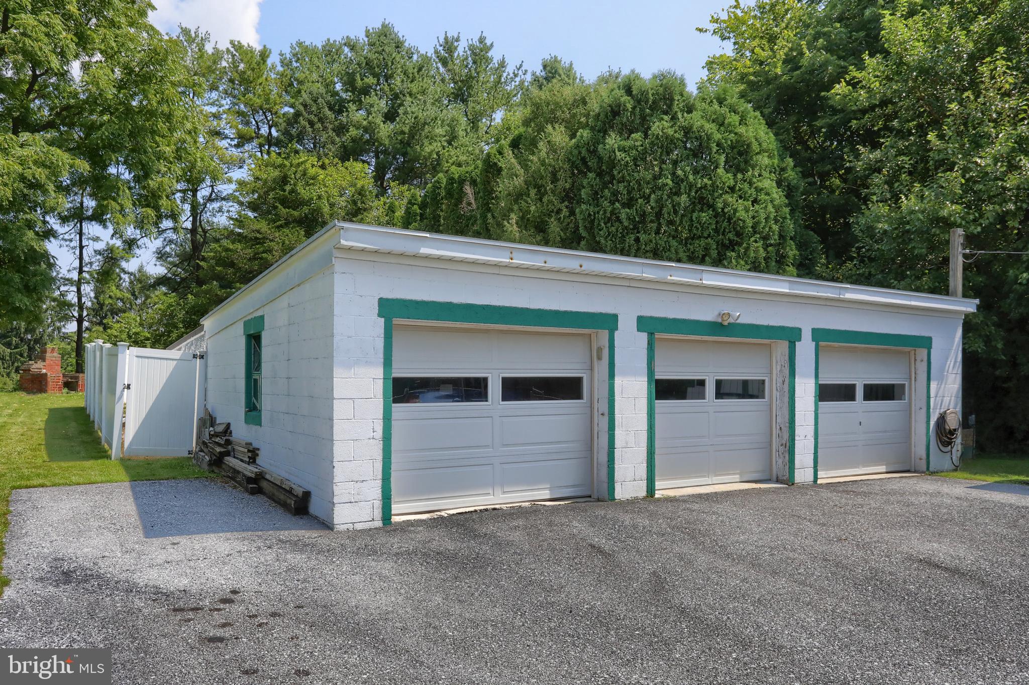 13 Montello Road Reading, PA 19608 - Photo 40 of 54 a view of a house with a backyard and garage