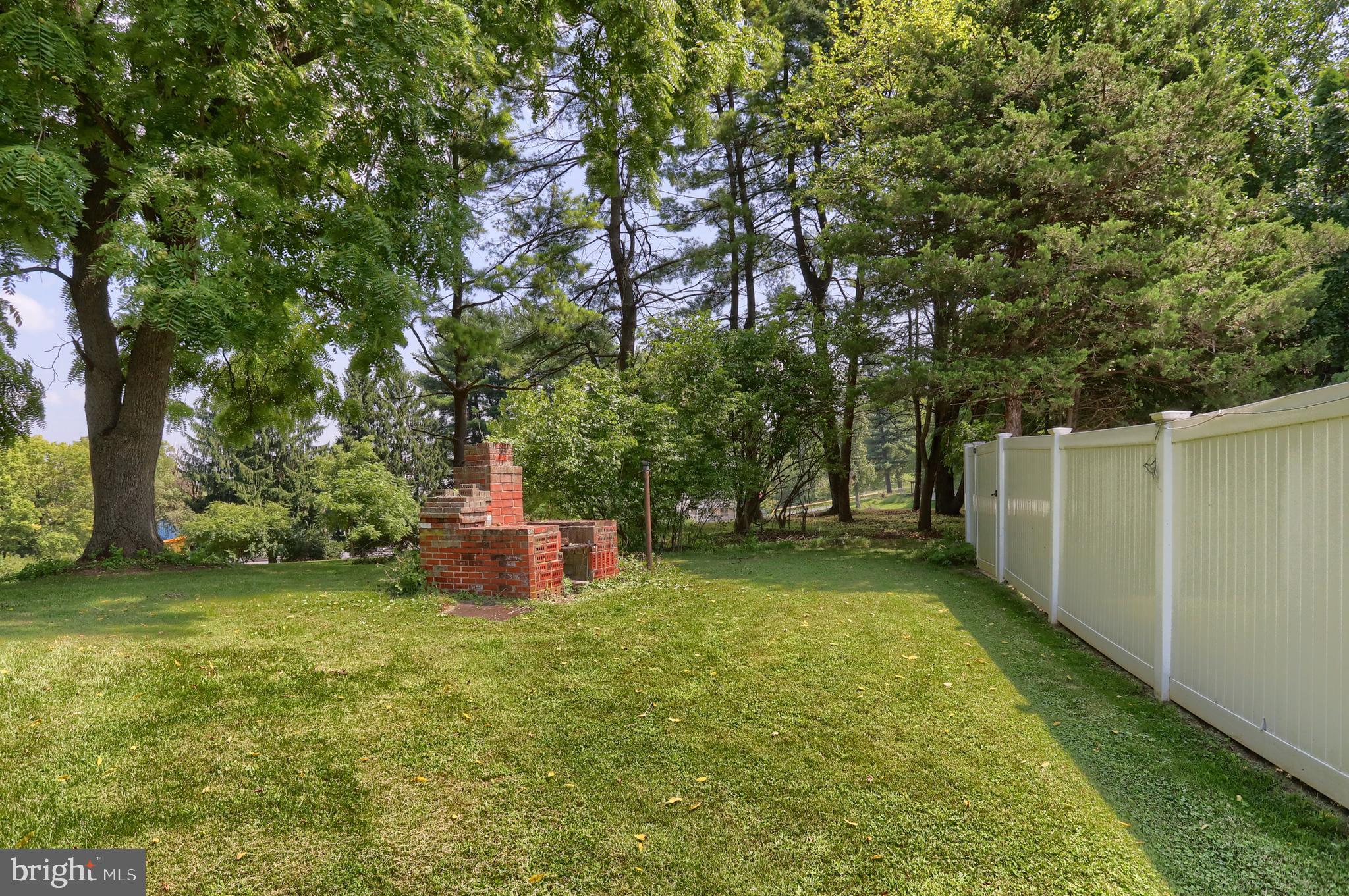 13 Montello Road Reading, PA 19608 - Photo 48 of 54 a view of a backyard with large trees