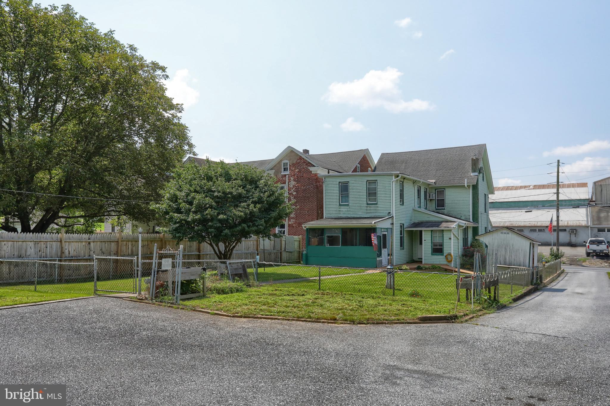 13 Montello Road Reading, PA 19608 - Photo 51 of 54 a view of a big house with a big yard and large trees